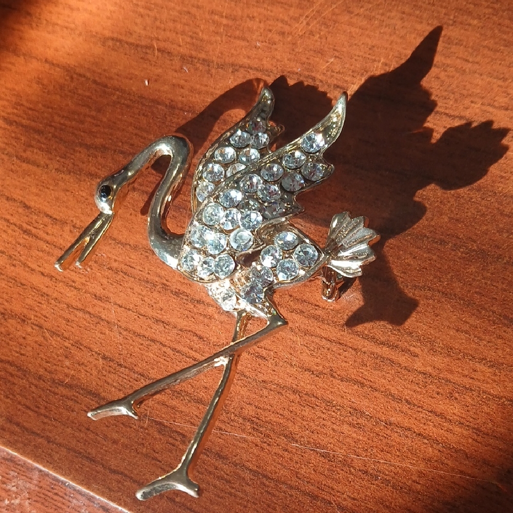 Elegant Gold and Silver Crane Brooch